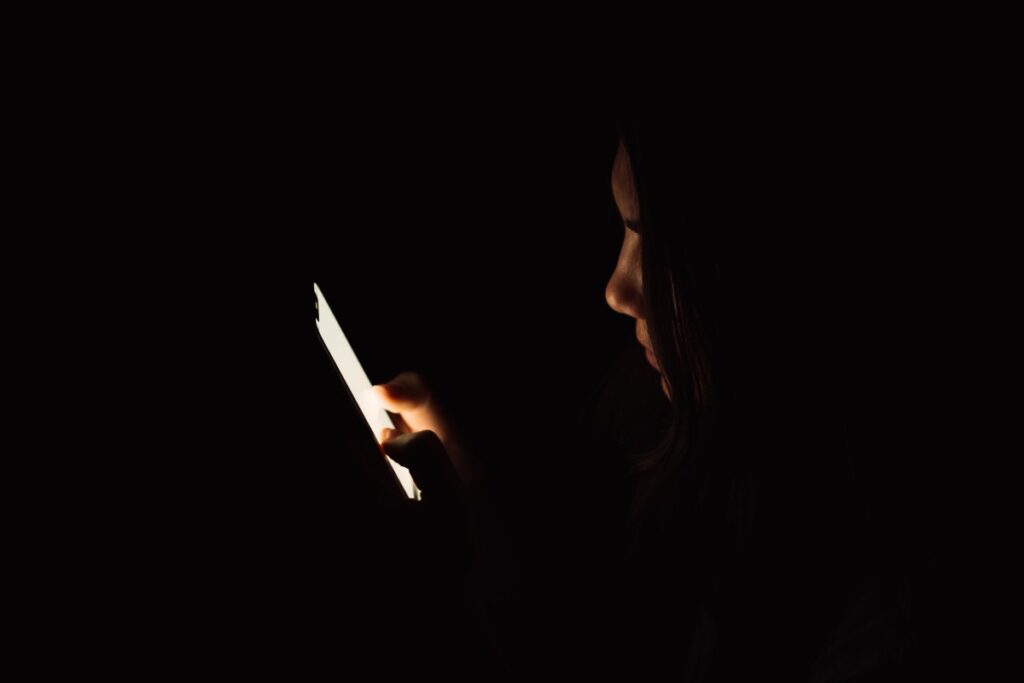 dark phone person spyware